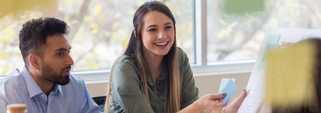 What is screenwriting blog_young woman in creative meeting