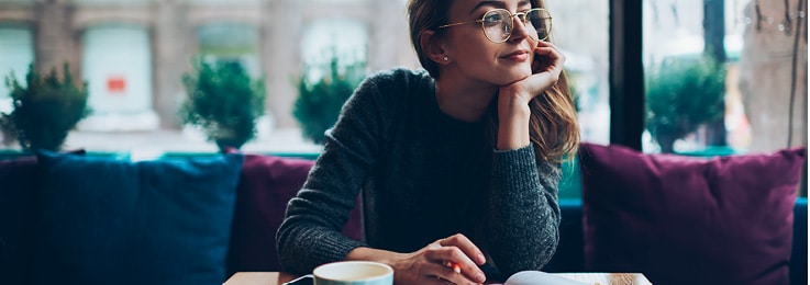 a woman is lost in thought