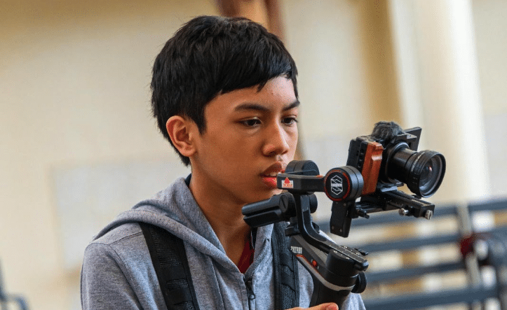 a film student with a camera