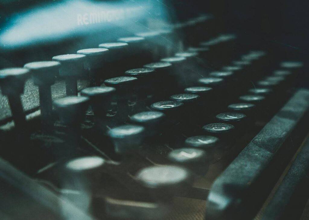 close up photo of a dusty old Remington typewriter