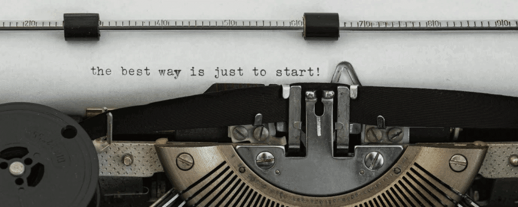 typewriter with paper in it that reads: "the best way is just to start!"