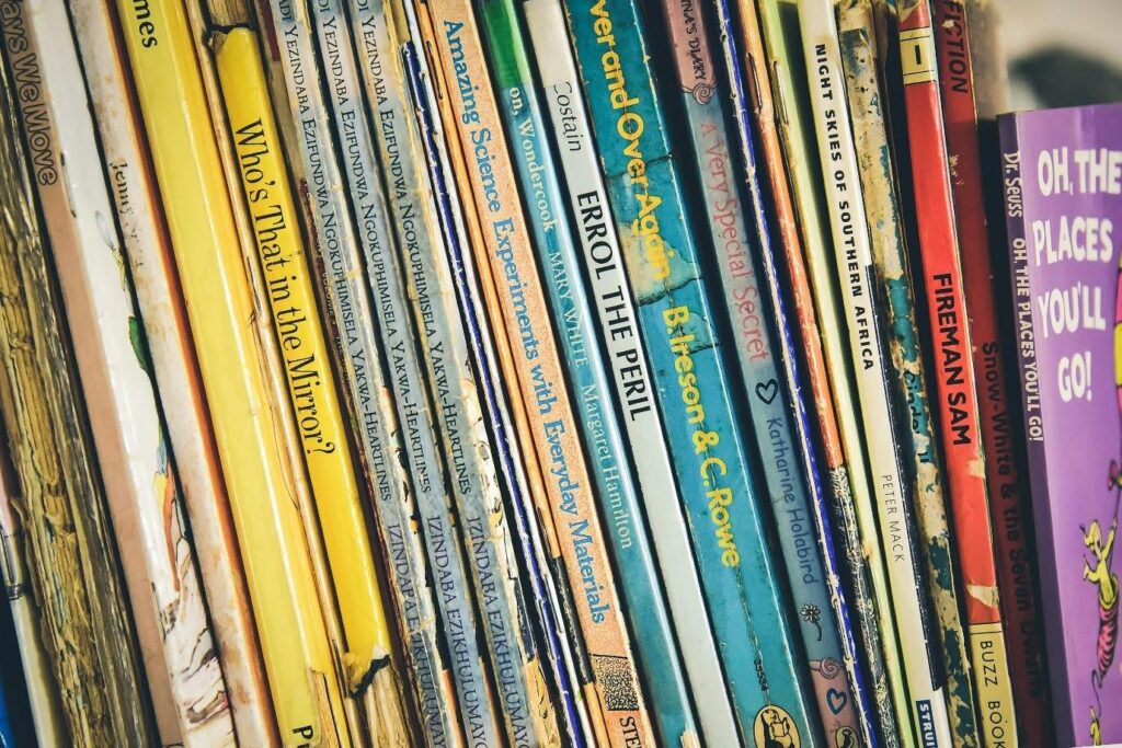 A row of classic short stories - their spines well worn from many reads.