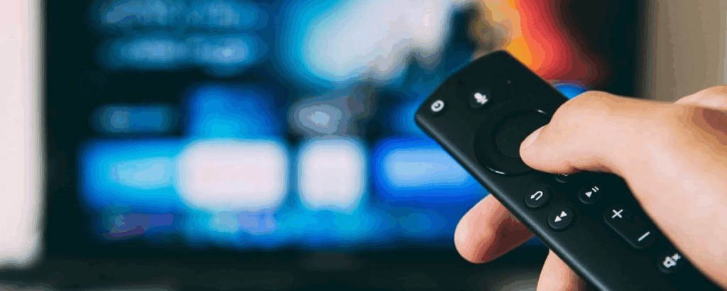 closeup of a remote aimed at a tv