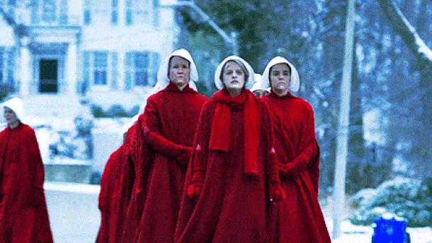 A gif of the Handmaids, lead by Offred, walking in sync. Under His Eye.
