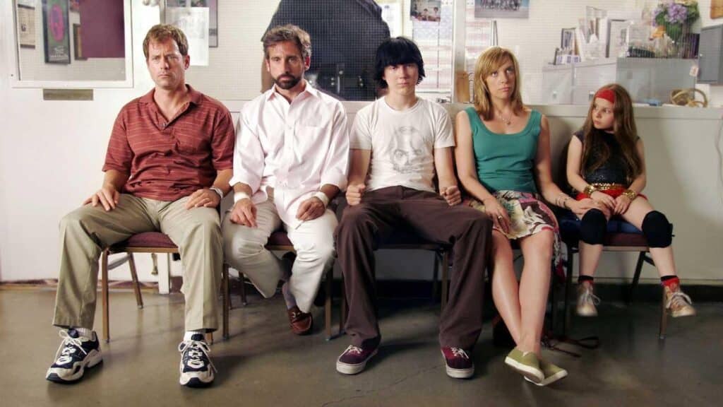 the cast of Little Miss Sunshine sit in a hospital waiting room.