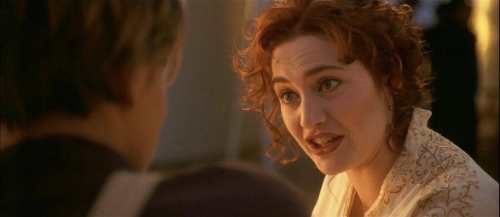 an example of an over the shoulder (OTS) shot from the movie Titanic. It is framed as a medium shot.
