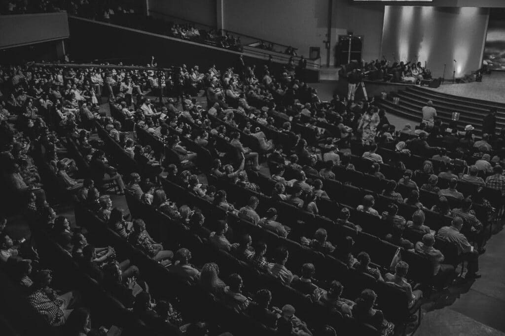 a crowded theater full of people
