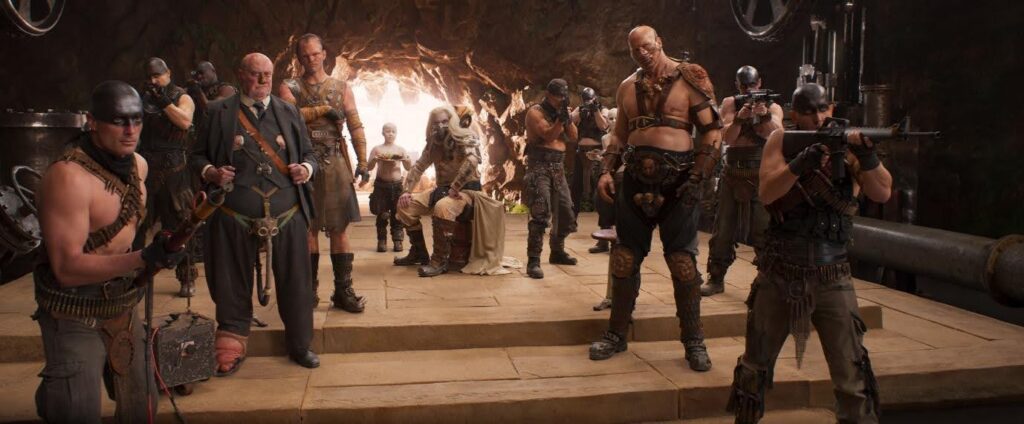 Immortan Joe and crew looks on in Mad Max: Fury Road
