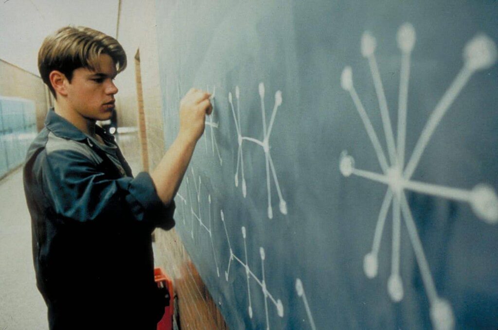 Will draws on a chalkboard