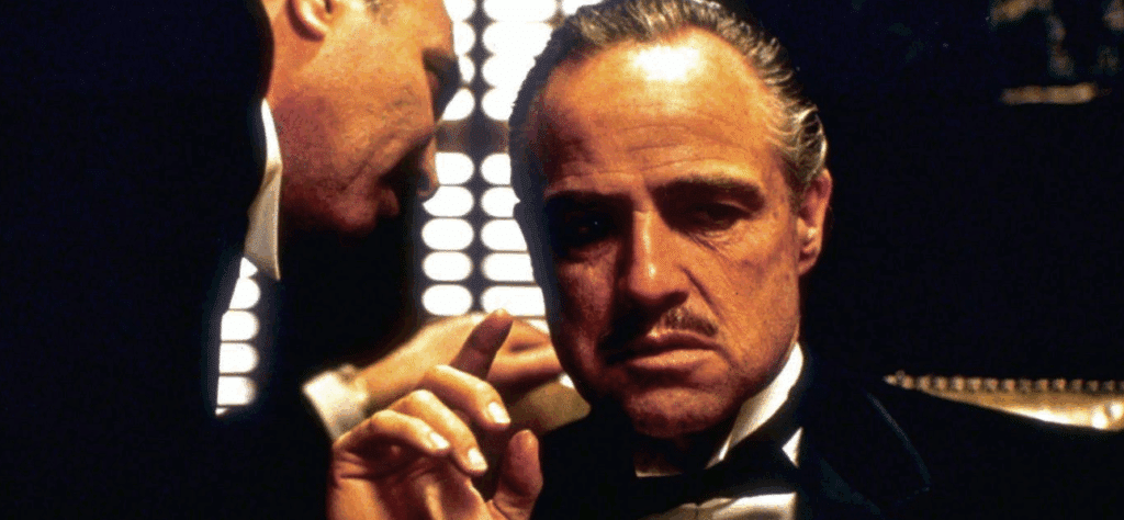 example of third person omniscient in film/screenwriting: The Godfather