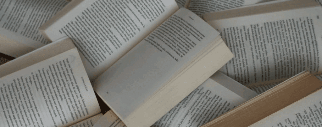 a pile of open books
