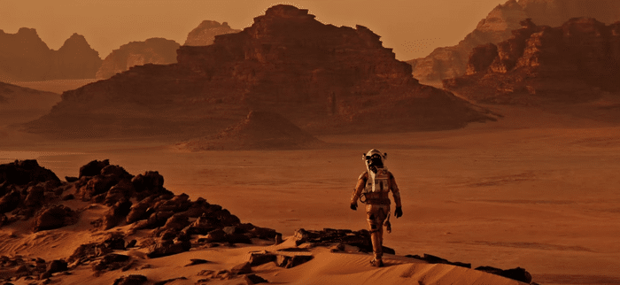 A still from the award-winning movie, The Martian, showing Matt Damon's character Mark Watney stranded on Mars. Learn more about screenwriting from Celtx!