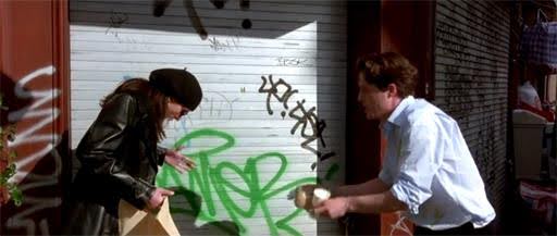A still from the film Notting Hill showing the moment Hugh Grant's character William spills orange juice all over Julia Robert's character Anna. Learn to write romance that sizzles on screen with the Celtx Screenwriting Series