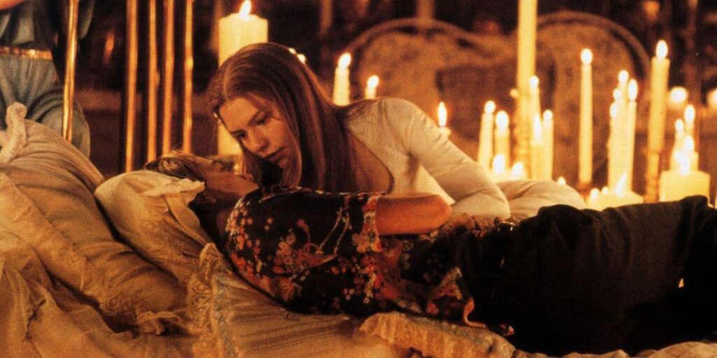 An example of dramatic irony in film: the scene in Romeo + Juliet where Juliet awakens from her slumber to find Romeo dead, which he did because he believed she was also dead.