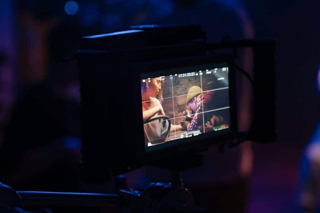 What does a cinematographer do? They set up the camera shots, much like the one shown in this photo of a viewfinder of a camera recording a scene for a film or commercial.