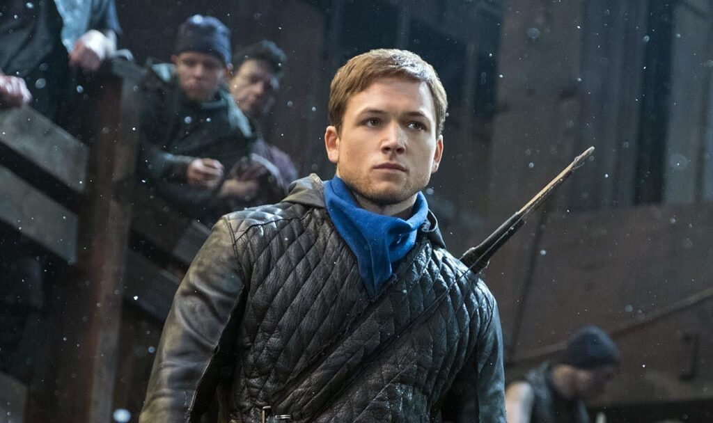 A still from the 2018 Robin Hood film - an example of The Outlaw character archetype.
