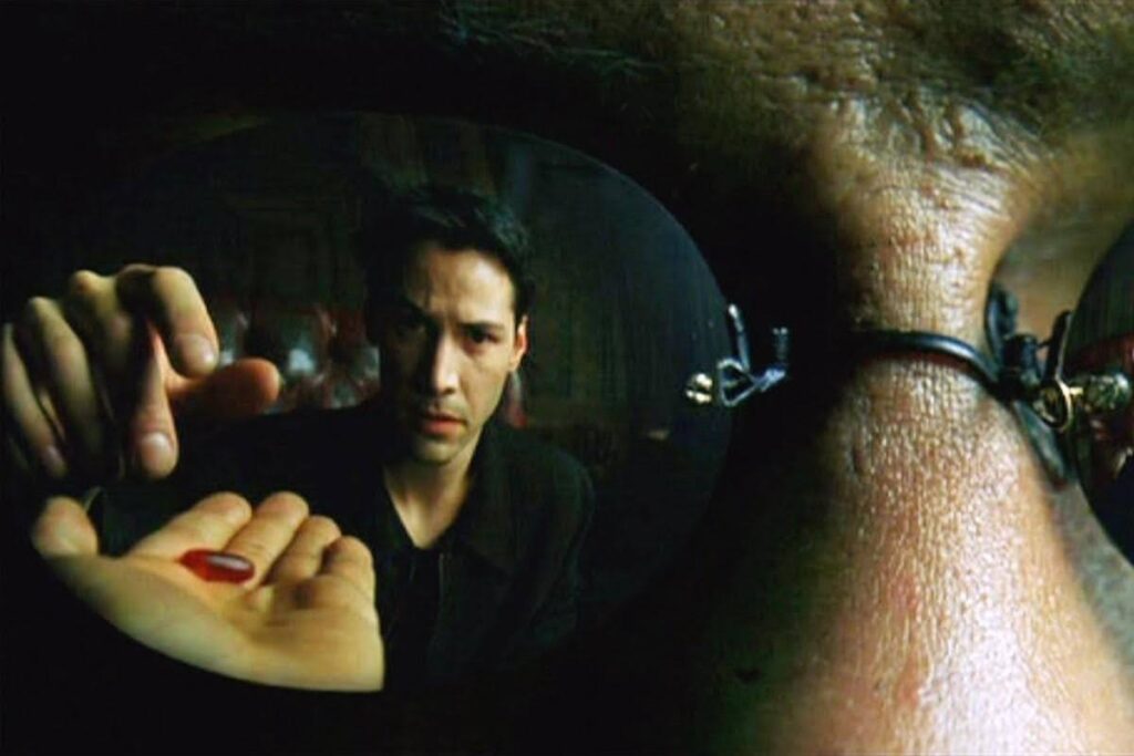 Neo makes a choice: the red pill. This is the Inciting Incident.
