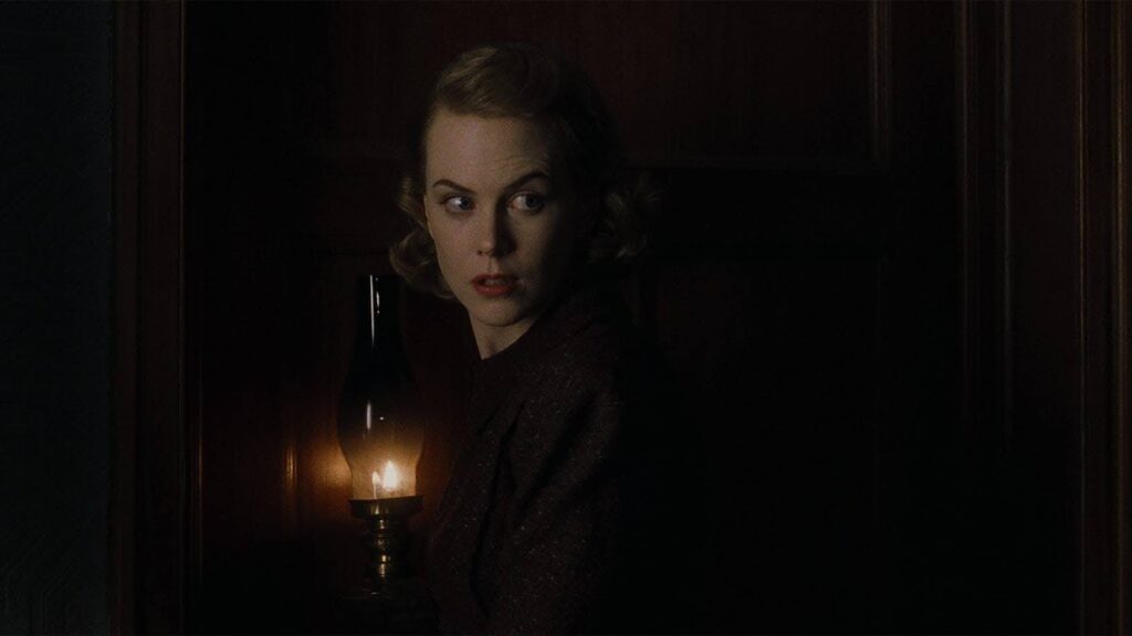 A still from the film The Others. Nicole Kidman's character illuminated by the flame of an old lamp.

Celtx script writing software