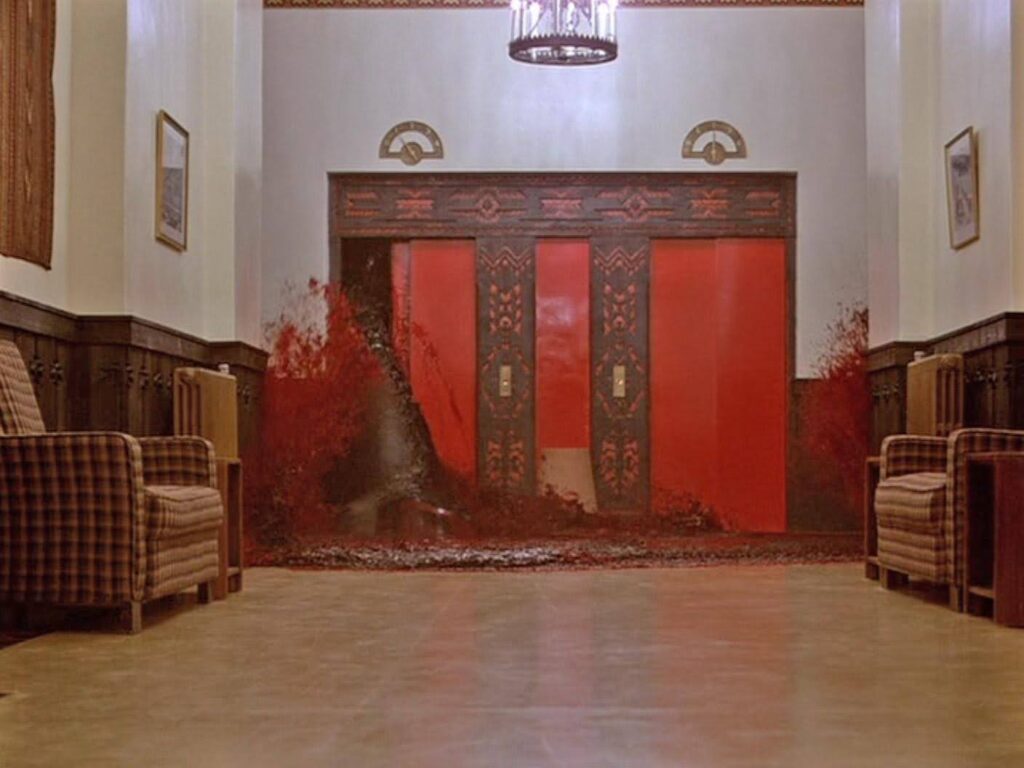 Blood pours out of the elevator in the Overlook Hotel (The Shining, 1980)