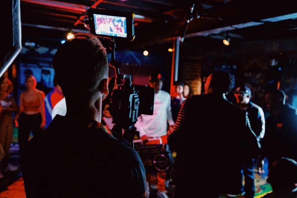A cameraman shoots a scene