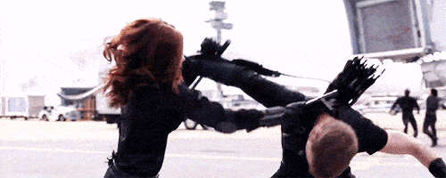 Black Widow and Hawkeye tussle: an example of inline action in a fight scene.
