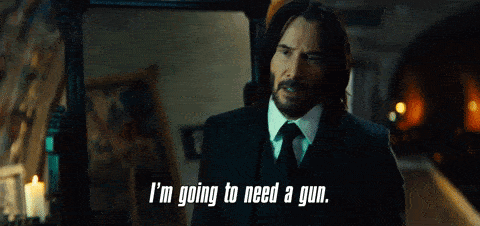 a gif of John Wick saying "I'm going to need a gun"
