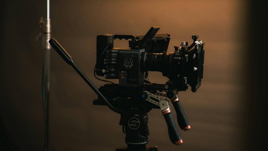 a film camera sits stationary