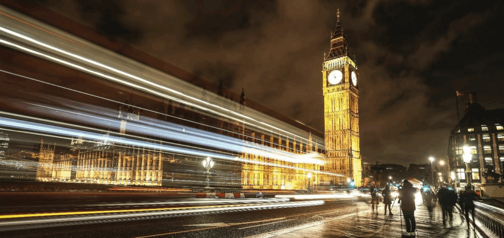 a film crew films what appears to be a time lapse scene in front of Big Ben