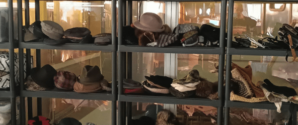 A shelf of props - hats and bags and maybe some shoes. These all go in your production catalog. Not physically, though.