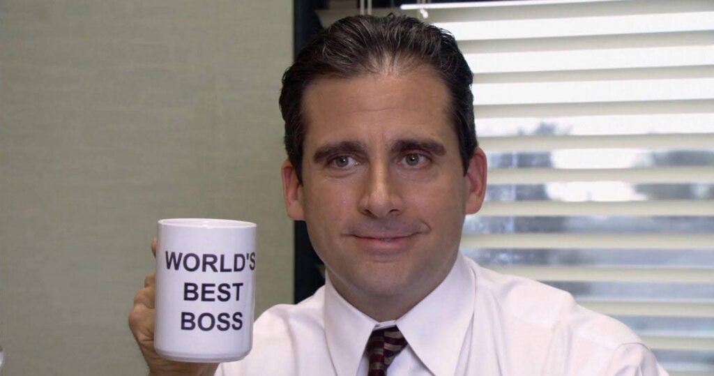 Michael Scott in The Office - an example of worldbuilding in comedy and television. Who wouldn't believe Dunder Mifflin could be a real company?