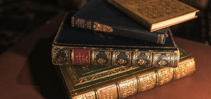 photo of a stack of old books filled with short stories