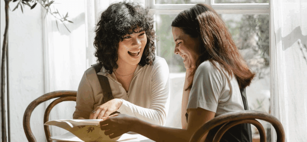 two women engaged in a very friendly conversation