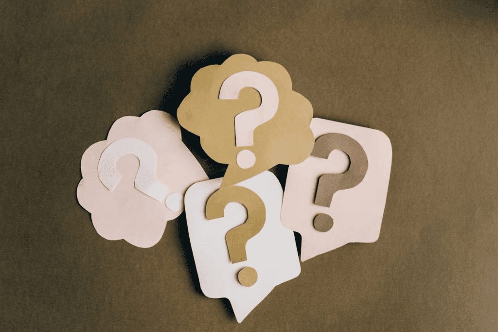 4 word bubbles with question marks in them