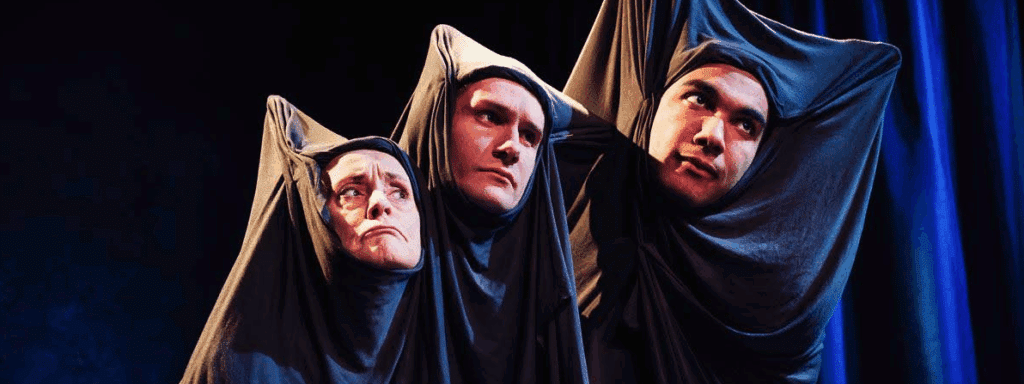 three actors in a performance of Eurydice