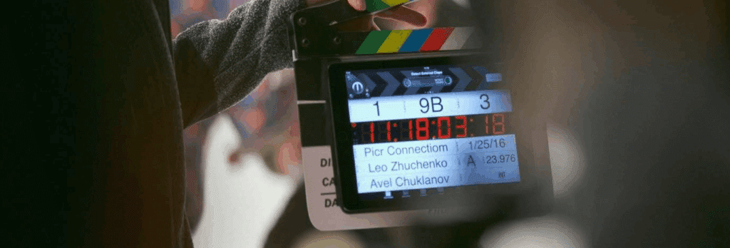 the clapboard of a film