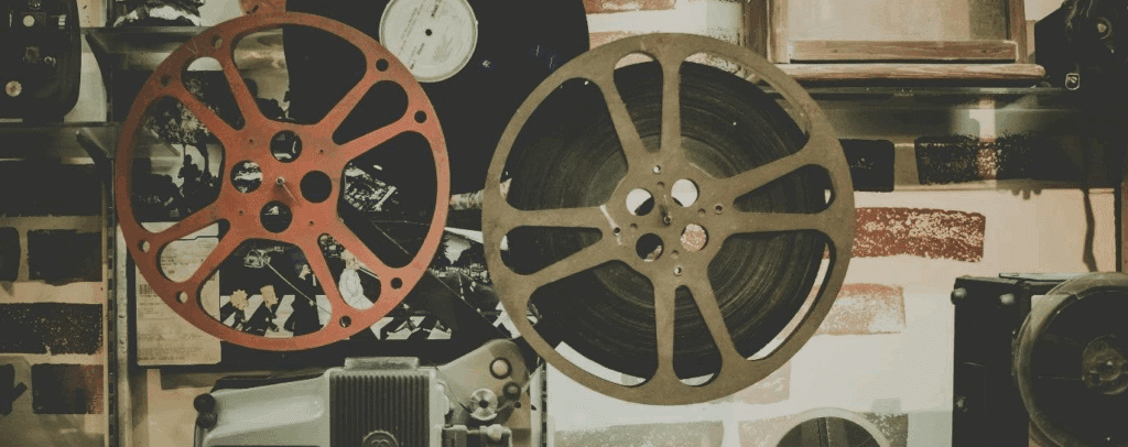two very old looking film reels