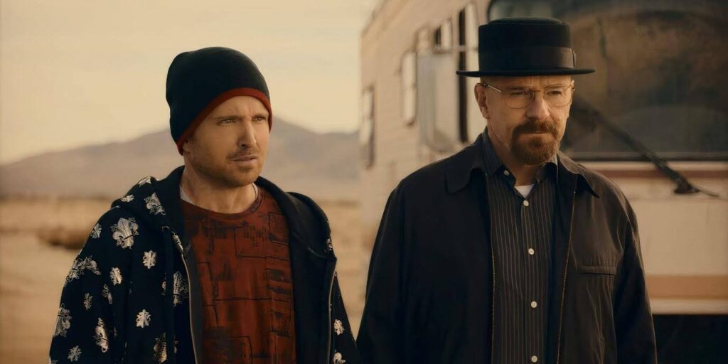 A still from the series Breaking Bad. Both main characters are wearing hats.