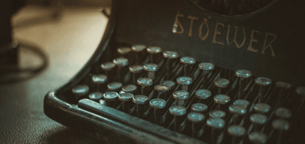 a closeup of the misaligned keys of an old Stoewer typwriter