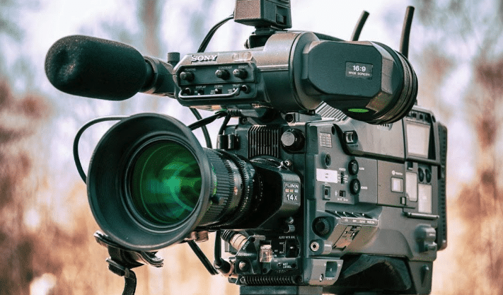 staring down the lens of a Sony film camera