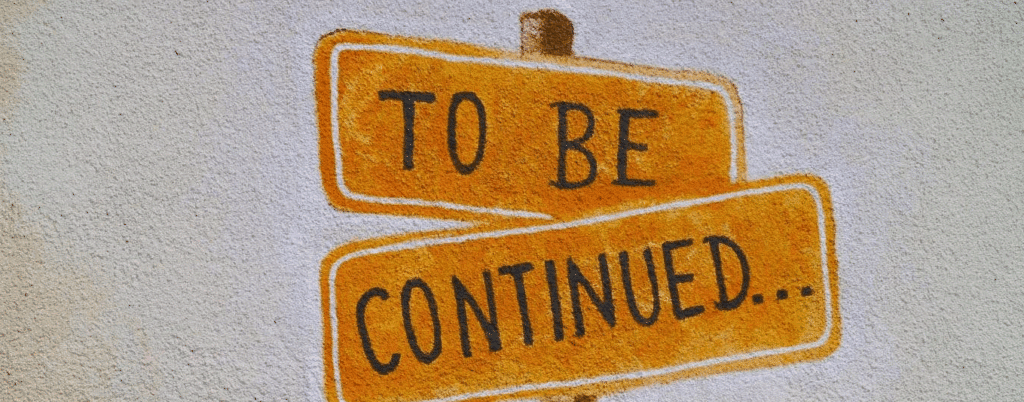 two road signs on a stick. one says "to be" and the other says "continued..."