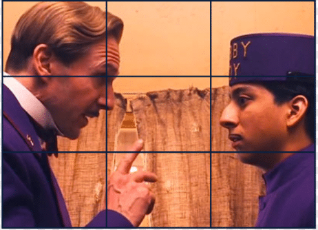 A still from the grand budapest hotel split into thirds.