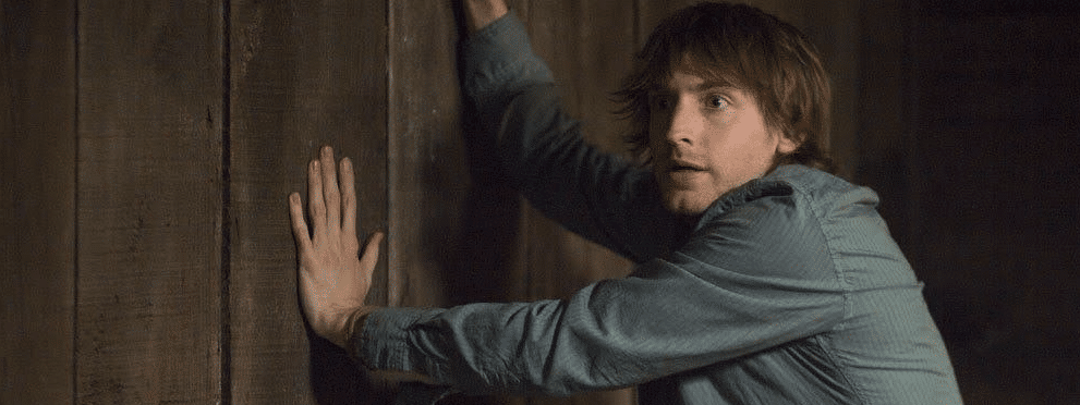 Marty holding a door closed. Marty is an example of "the fool" character archetype (but he is also the Doomsayer archetype).