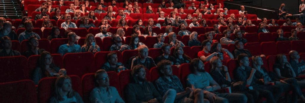 film exhibition

a movie theater full of people