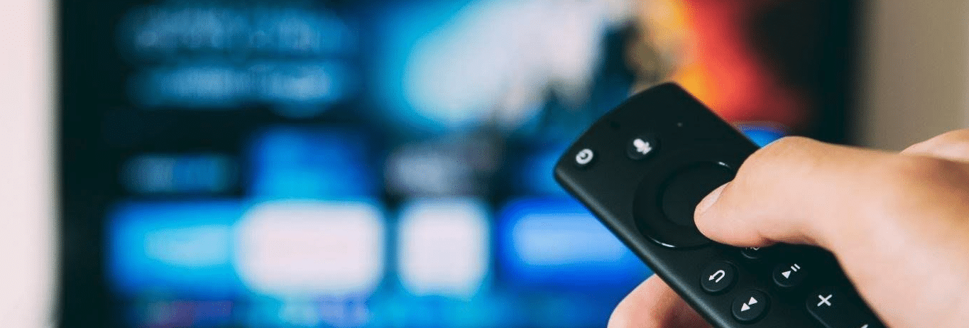 POV shot of someone changing their tv's channel (or streaming service)