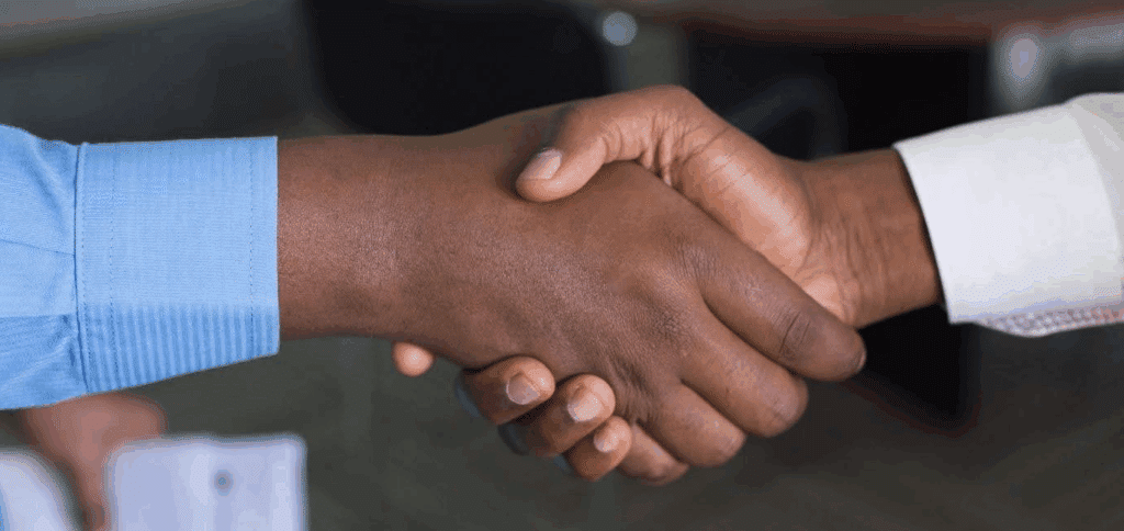 film exhibition

a closeup photo of two hands shaking (a handshake)