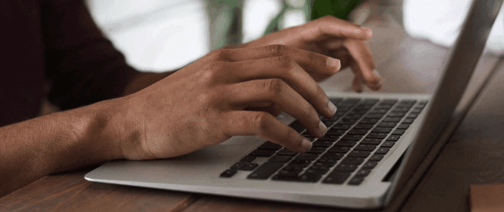screenplay margins

close up photo of two hands typing on a laptop