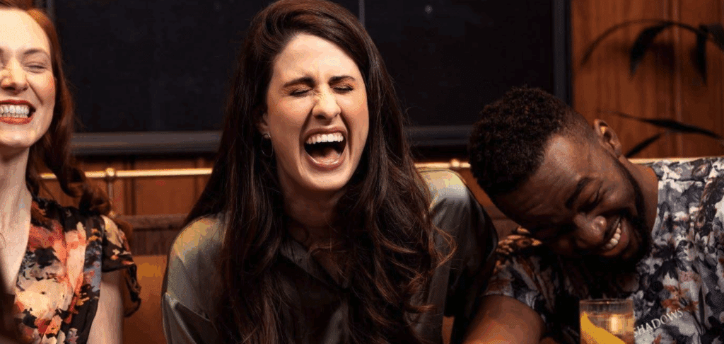 photo of three people laughing pretty hard