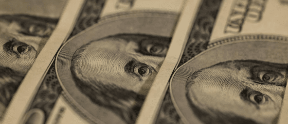 close up photo of a stack of benjamins (0 bills)